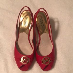 Authentic Michael Kors red patent leather wedges